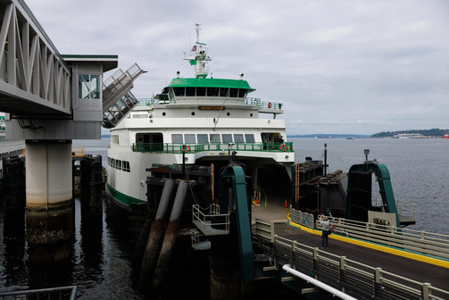 The hybrid-electric ferry at a ferry dock 