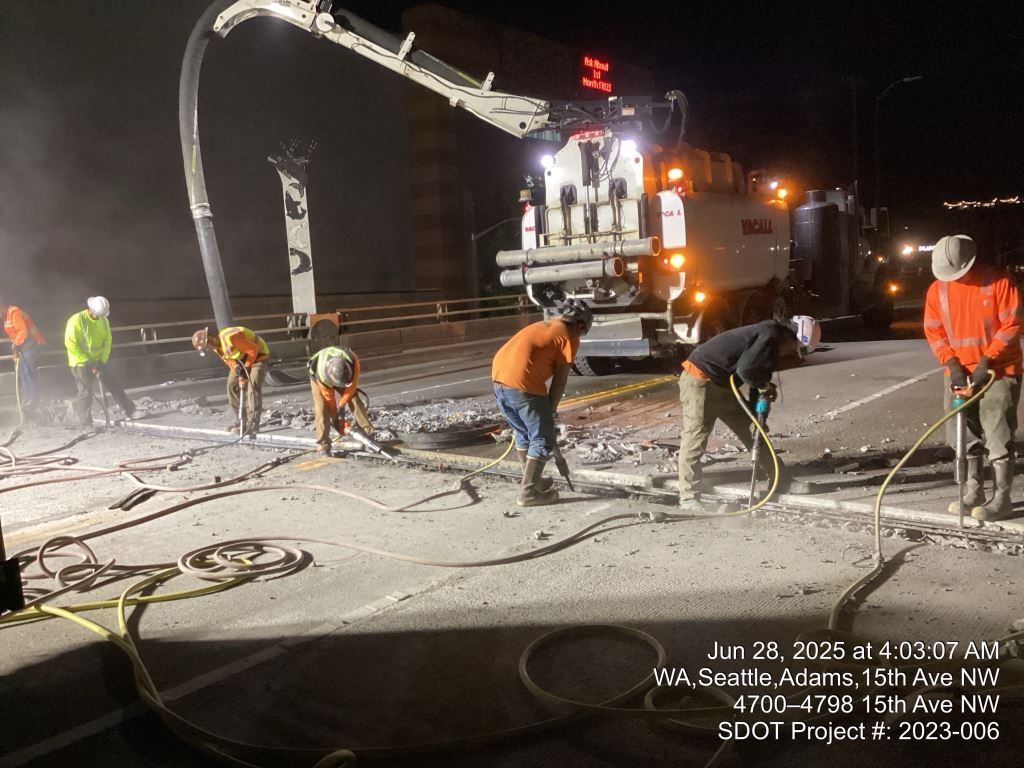 Crews remove old expansion joins on the Leary Way Bridge deck. Image taken June 28, 2025.