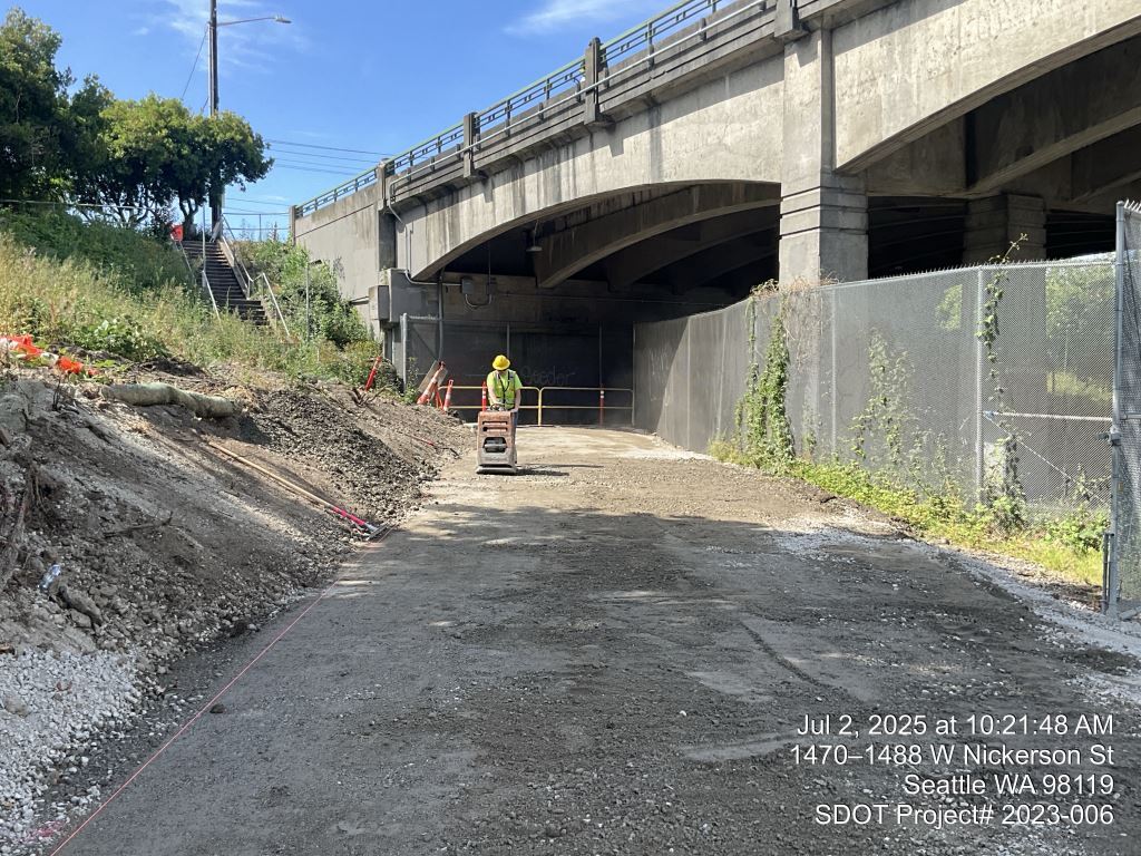 Ongoing trail and sidewalk restoration on the pedestrian walkway underneath the Ballard Bridge. Image taken July 2, 2025.