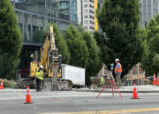 Construction crews working on Denny Way