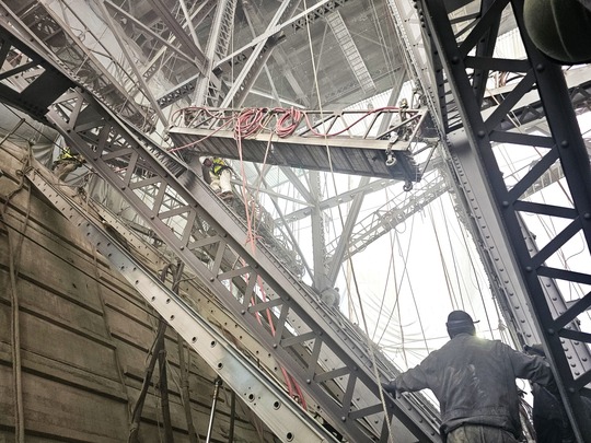 Under deck view of bridge with old paint removed, primed and ready for paint.