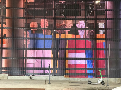 An installation of giant puppets at the Seattle Waterfront