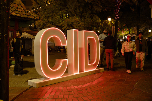 Large letters spelling out C-I-D illuminates in the dark