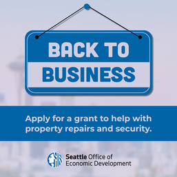 graphic of a door sign that says back to business