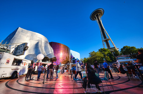 Exterior shot of MoPop with people on the plaza