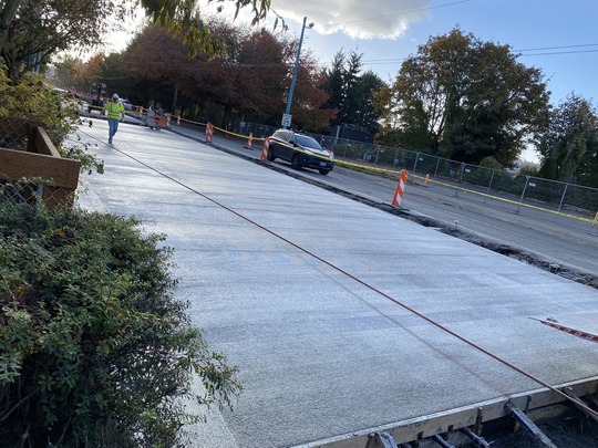 New pavement cures on Eastlake Ave E between E Shelby St and E Allison St. 