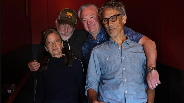 Downpilot bandmates pose for a portrait