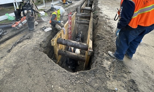 Crews access water utilities beneath Eastlake Ave E.