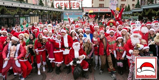 Many people dressed up as Santa at SantaCon taking a group picture outside of Pike Place Market