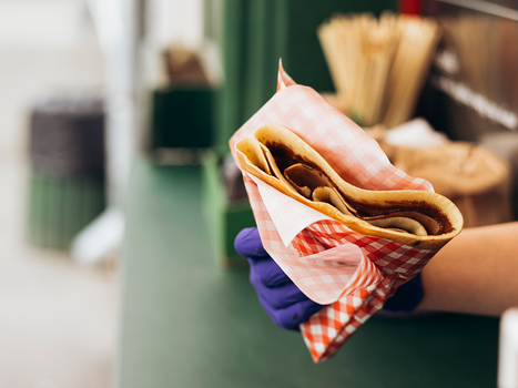 A person holding a crepe