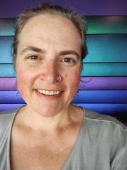 Photo of Carrie, a white woman smiling