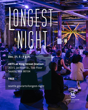 purple-hued photo of people seated in a gallery space meditating