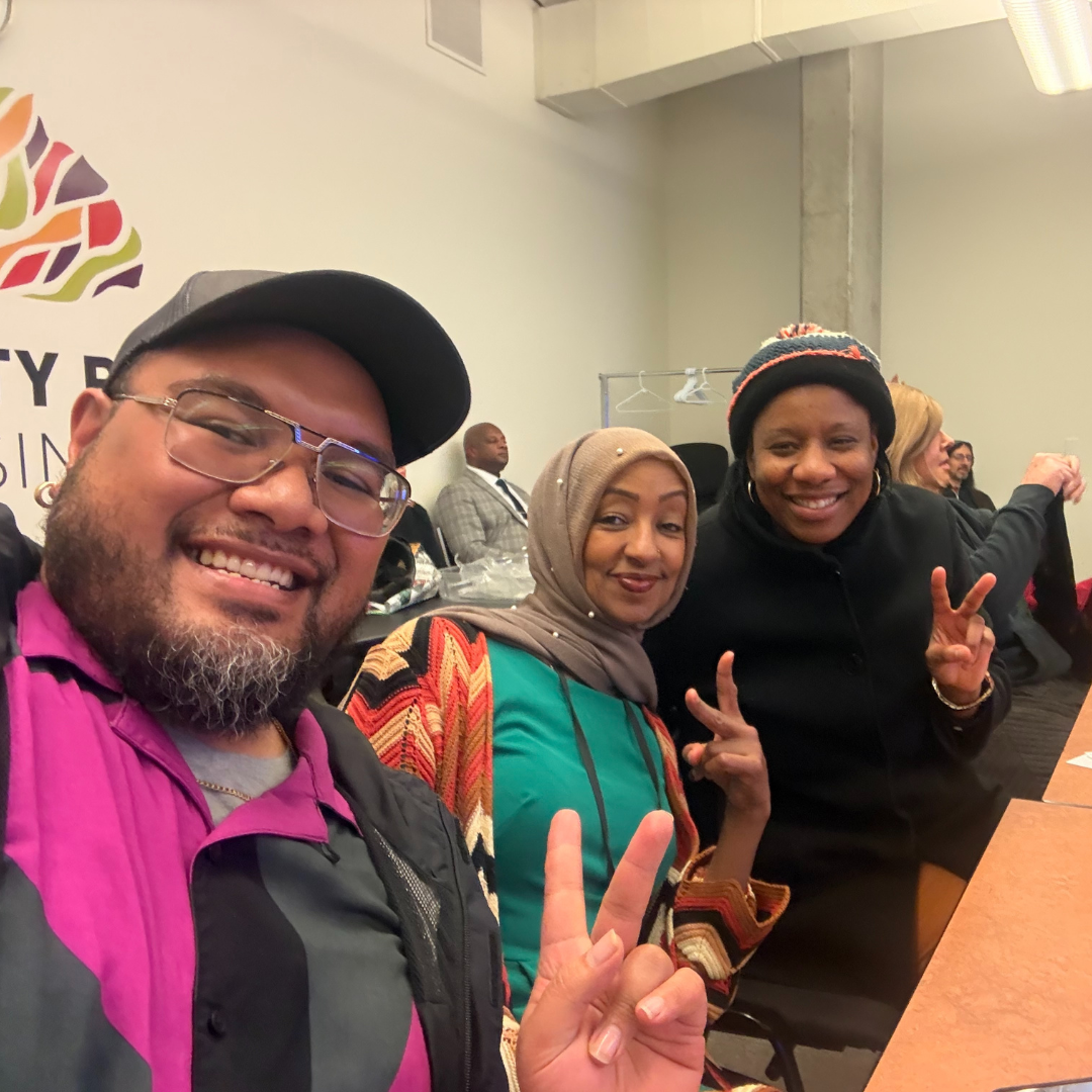 Mario & Mergitu sitting next to CM Hollingsworth at 2SLGBTQIA+ Advisory Council