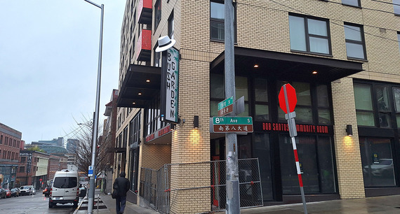 A hat on top of the Bush Garden sign in the C-ID honoring activist “Uncle Bob” Santos