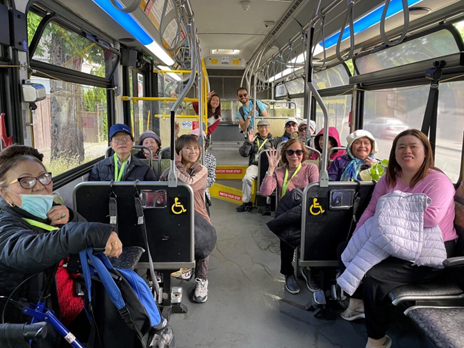 Participants in SDOT's Transportation Access Program ride a bus in Seattle.