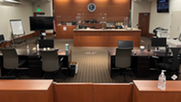 Background image of an empty Seattle Municipal Courtroom