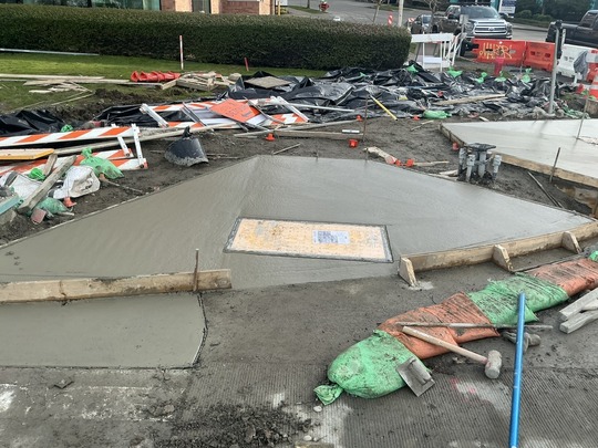 A new pedestrian ramp dries. 