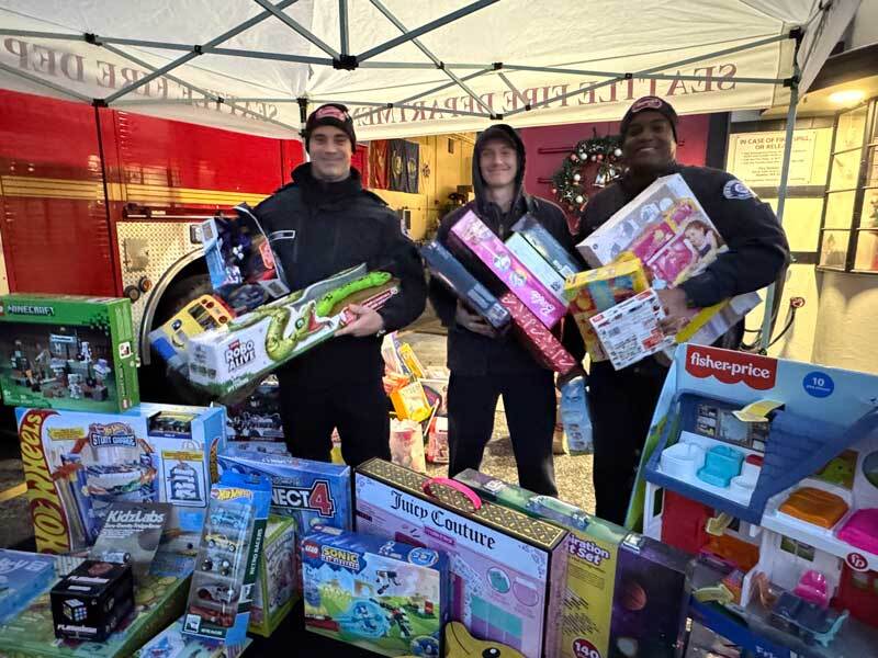 Firefighters delivering for Toys for Tots