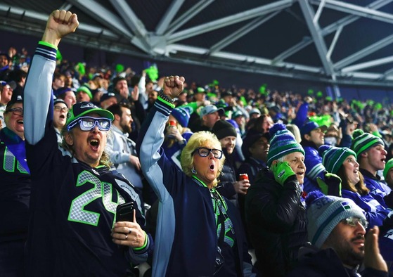 Fans cheer on the Seahawks at Lumen Field