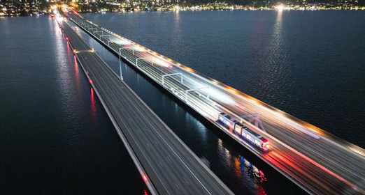 A new Link light rail running across Lake Washington on the I-90 floating bridge