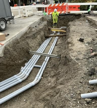 Crews install new electrical lines. 