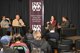 Mayor Wilson (with daughter) and Deputy Mayor Surratt speaking at the NW African American museum, along with Councilmember Foster