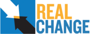 Real Change's Logo: Two arrows coming together diagonally. 