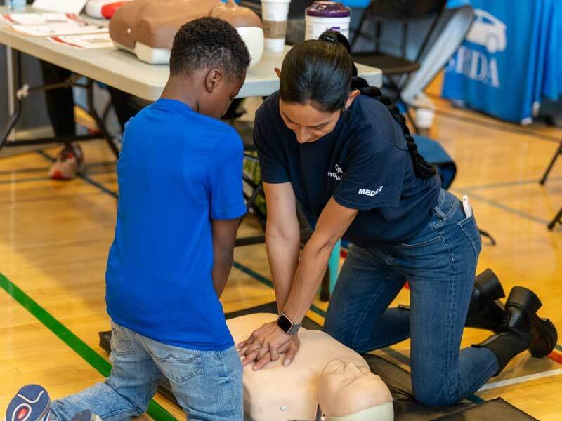 Instructor demonstrating bystander CPR