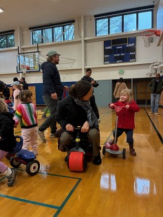 Mayor Wilson playing with daughter at Hiawatha re-opening