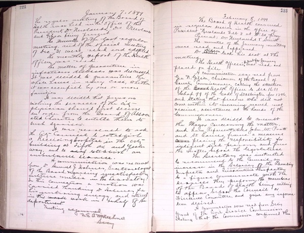 Large old volume open to page showing handwritten Seattle Board of Health minutes from January 1899