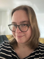 Color portrait of Seattle City Archivist Sarah Shipley