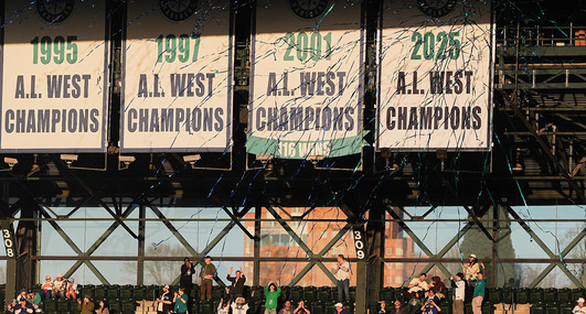 The Mariners' 2025 American League West champions banner is unveiled in T-Mobile Park