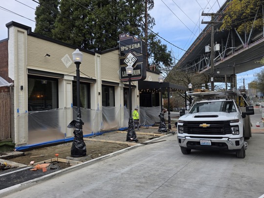 Crews begin building new sidewalks outside of Imperia Lake Union. 