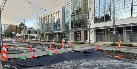 Tarps cover areas prepared for new concrete to protect them from the weather. 