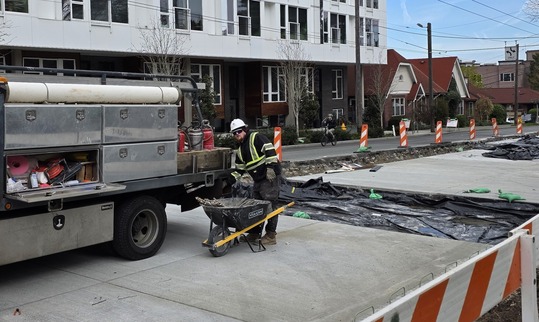 Crews pour new concrete in sections on Eastlake Ave E. 