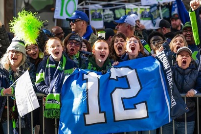 Smiling fans at Seahawks win