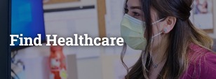 Health professional looking at computer monitor. Find Healthcare written across the image.