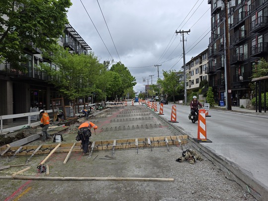Crews place metal supports before they pour new concrete. 