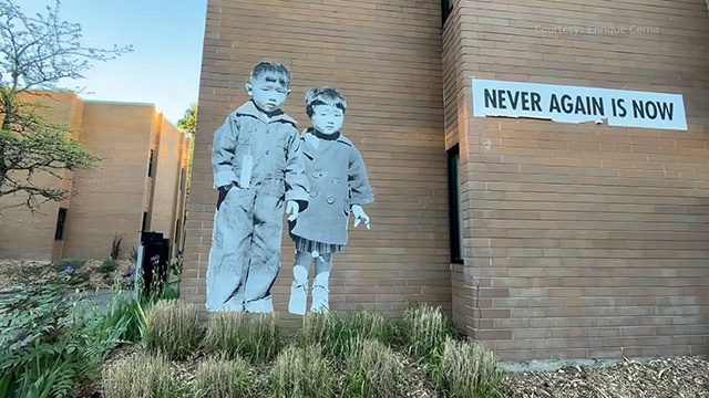 A mural of two children on a wall at Bellevue College.