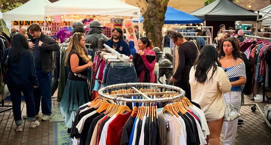 People shopping at the Occidental Square Flea Market