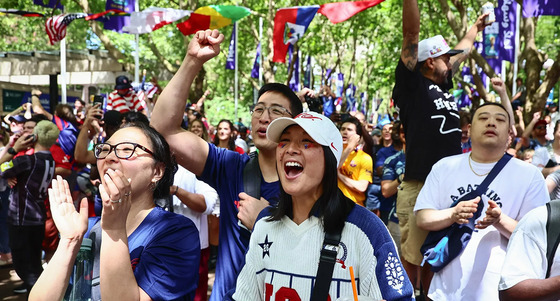 Fans cheering during the USA vs Australia FIFA match in Pioneer Square