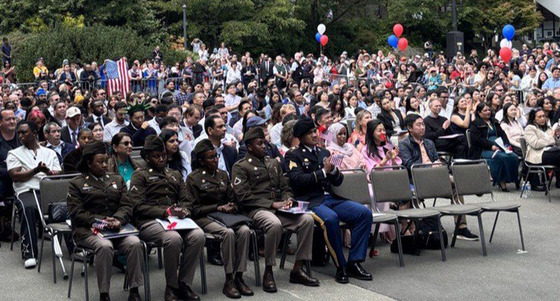 People attending the 2026 naturalization ceremony at Seattle Center