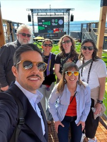OED team smiling at World Cup floating barge