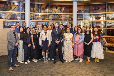 OED staff smiling and celebrating new director