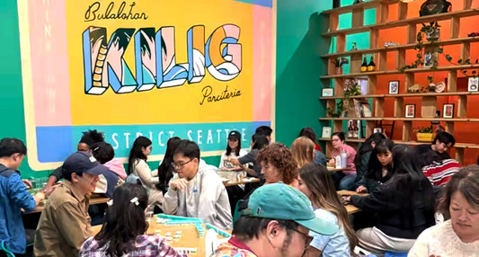 People eating at Kilig, a restaurant in the C-ID