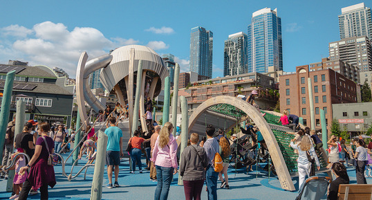 Children climbing and enjoying the playground on Pier 58