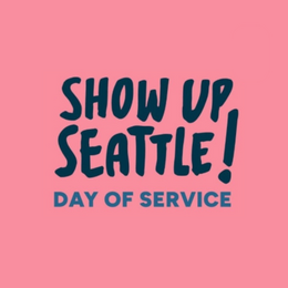 Pink graphic reading “Show Up Seattle! Day of Service” in bold blue text.
