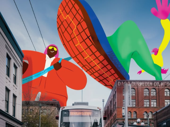 Two giant cartoon figures stride over a Seattle Streetcar at Broadway & Denny, one in a red suit, the other lifting a massive orange shoe.