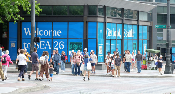 People crossing the street at an intersection in Downtown Seattle