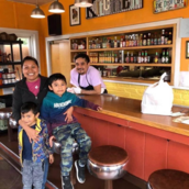 The Dish Café owners with family smiling